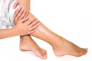 Symptome Krampfadern Beine bei Frauen